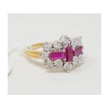 A 9ct gold, baguette cut ruby and diamond set ring Report by RB Modern Approx. ring size N ½