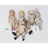 A bisque doll, 15 cm high, and four others similar (5) Modern