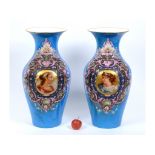 A pair of late 19th century Continental porcelain vases, decorated classical female busts within