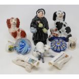 A Royal Doulton figure, Sairey Gamp, HN558, cracked, a group of glass paperweights, Goss china and