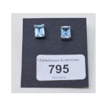 A pair of silver and blue topaz earrings Modern