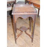 An Edwardian mahogany table, with pierced and blind fret carved decoration, 41.5 cm wide