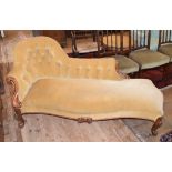 A Victorian scroll end chaise longue, on cabriole legs with knurl feet
