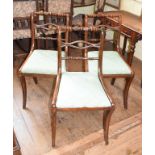 A set of six Regency style beech dining chairs, on sabre legs (6)