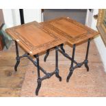 A pair of Anglo-Indian tables, the rectangular satinwood tops on ebonised legs, 67 cm wide (2)