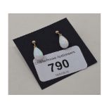 A pair of 9ct gold and teardrop gilson opal earrings Modern