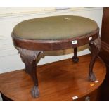 A mahogany stool, on cabriole legs, 70 cm wide