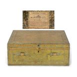 An early 19th century brass mounted travelling trunk, with studwork decoration, the interior applied
