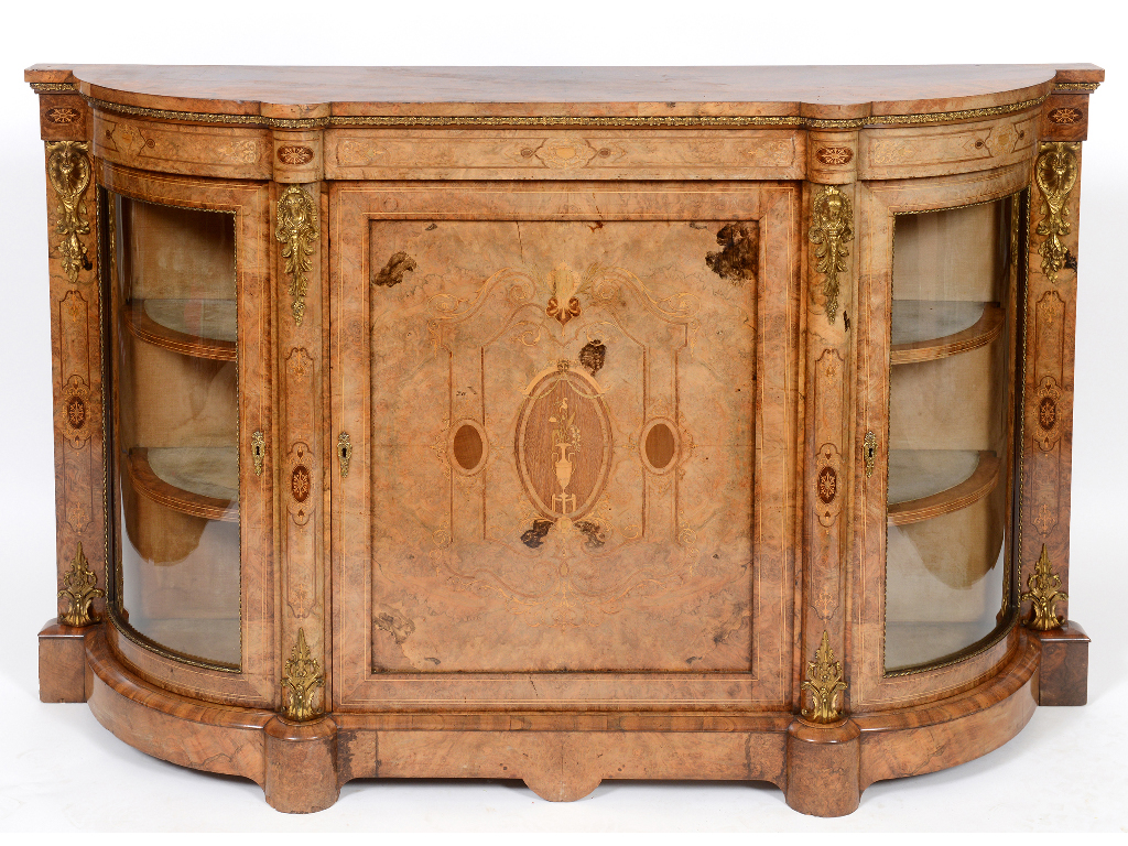 A Victorian burr walnut credenza, inlaid an urn, swags and scrolling foliage, having a central panel