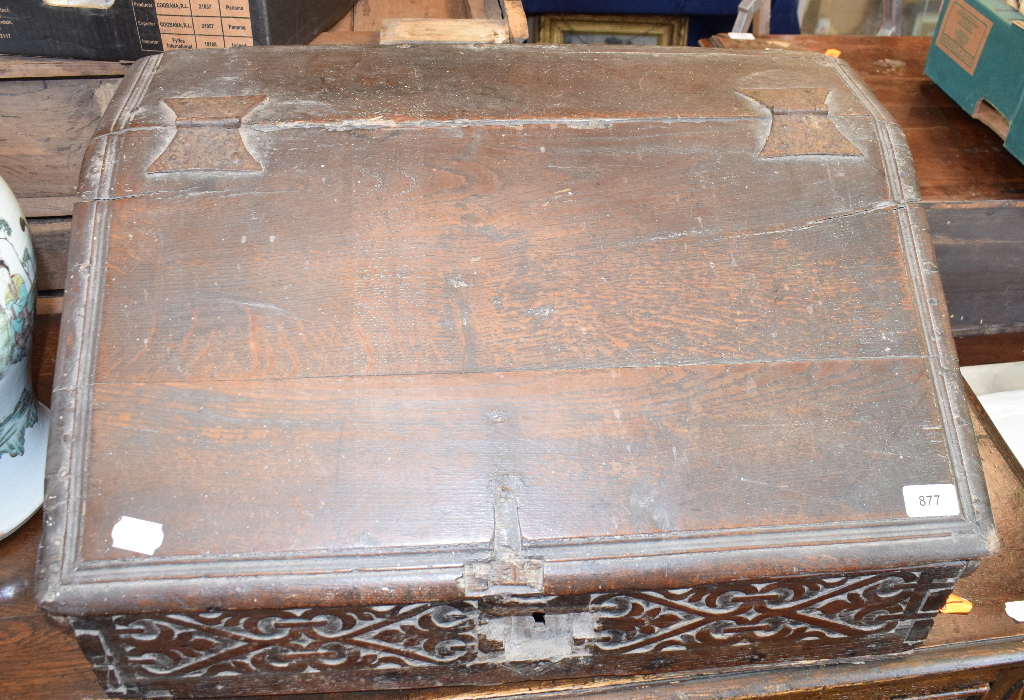 A late 17th/early 18th century carved oak bible box, 64 cm wide