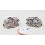 A pair of silver condiments, in the form of rabbits Report by RB Modern