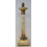 An onyx table lamp, with champleve enamel mounts, 44 cm high (excluding electric fitments)