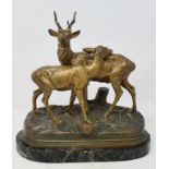 A bronze group, of a stag and doe, after Alfred Dubucand, on a marble base, 21 cm high See