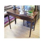 A 19th century inlaid mahogany serpentine front card table, on tapering square legs, 90 cm wide