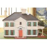 A tabletop model of a colonial house, 60.5 cm wide