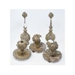 An Indian pair of silver coloured metal filigree work rosewater sprinklers, 34 cm high, another