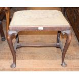 A George I style walnut stool, on cabriole legs with pad feet, 57 cm wide