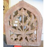 A Mughal sandstone panel, of lancet form, with floral decoration, 41 cm wide