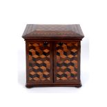 A Victorian Tunbridge ware table top rosewood cabinet, with geometric parquetry decoration, the lift