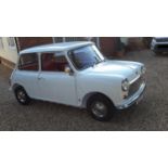 A 1971 Austin Mini 1000 MkIII, registration number ATR 22K, white. This beautifully presented,