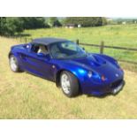 A 1997 Lotus Elise S1, registration number L33 JTS, azure metallic blue. The S1 had a low production