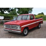 A 1968 Ford F100 pickup truck, unregistered, red/white. Introduced in 1966 Fords fifth generation of