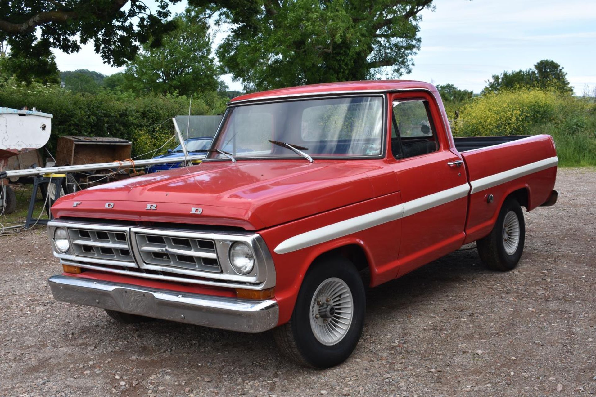 A 1968 Ford F100 pickup truck, unregistered, red/white. Introduced in 1966 Fords fifth generation of