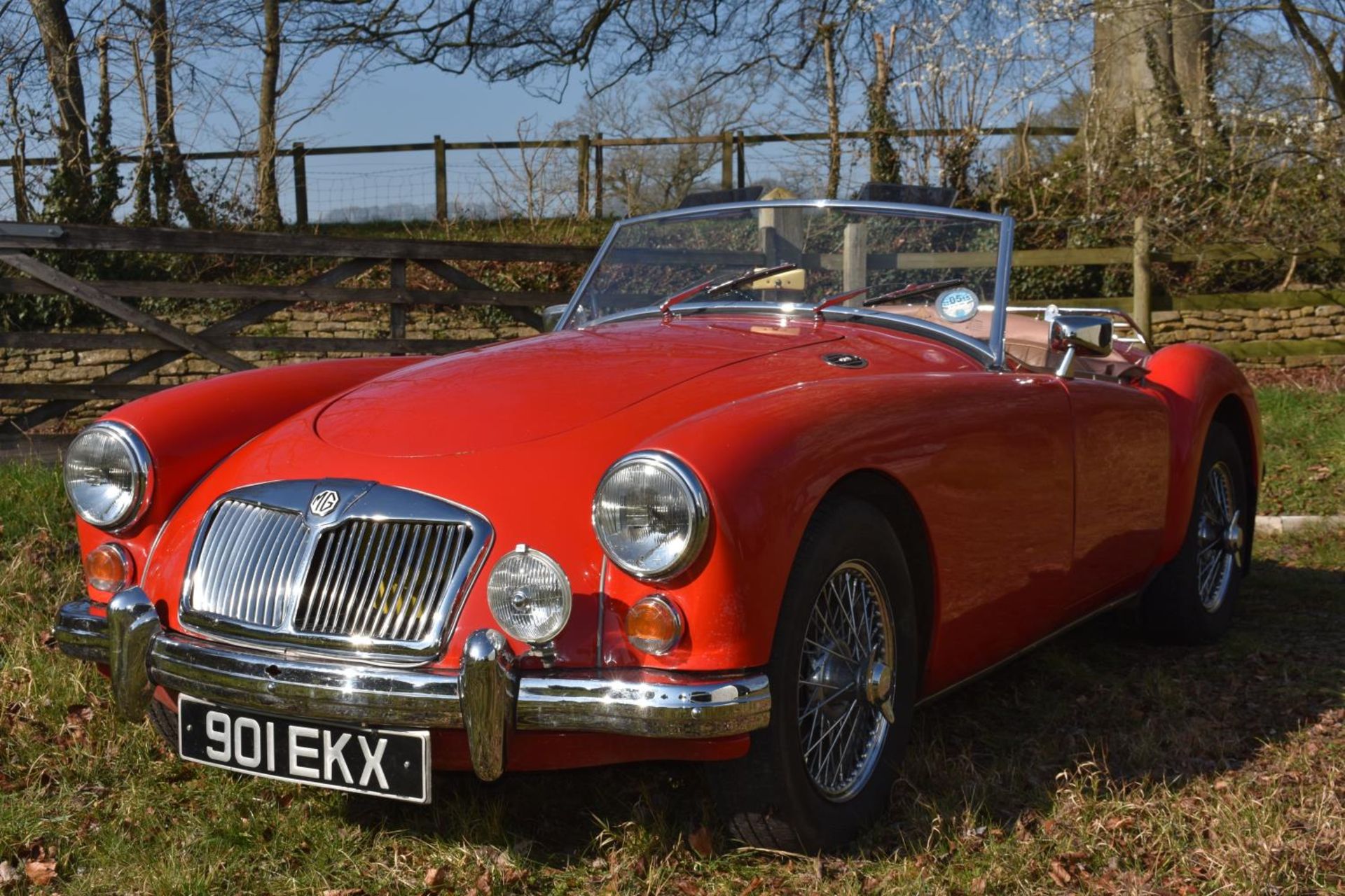 A 1956 MG A Roadster 1500, registration number 901 EKX, Chariot red. The all new MG A was launched