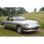 A 1986 Alfa Romeo Spider 2.0 Veloce Series III, registration number C652 PKC, Silver. The Alfa