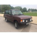 A 1986 left hand drive Range Rover Classic two door, registration number C140 BDL, Burgundy