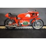 A 1963 Aermacchi Harley-Davidson 250cc, unregistered, red and white. This fully restored and