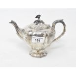 A silver teapot, of melon form, with a flower finial, Birmingham 1921, approx. 14.4 ozt
