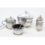 A silver mustard pot, Birmingham 1917, other silver condiments and two silver condiment spoons (6)