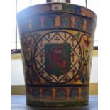 A large Continental majolica jardiniere, of tapering cylindrical form, decorated heraldic motifs, 39