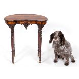 A Victorian kidney shaped occasional table, having a coromandel wood top and turned mahogany legs,