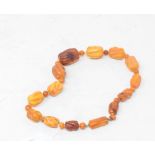 An amber type bead necklace Report by GH Gross 48.5 g