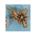 An 18ct gold, diamond and sapphire flower brooch See illustration Report by GH Gross weight