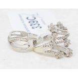 A 9ct white gold dress ring, approx. ring size S, and another similar