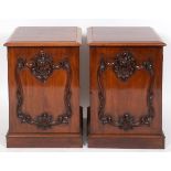 A pair of mahogany pedestals, with carved decoration, 56 cm wide (2) See illustration
