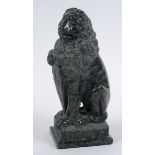 A Grand Tour style carved marble figure, in the form of a lion holding a shield, on a square base,
