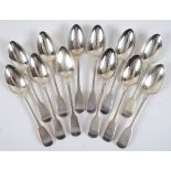 A set of twelve early 19th century silver fiddle pattern tablespoons, crested, London 1810,