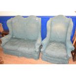 A two seater wing back settee, a matching armchair and another armchair (3)