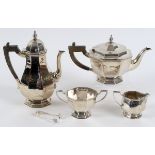 An octagonal silver four piece tea set, initialled and dated, London 1898, and a pair of sugar