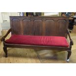 A 19th century oak settle, on cabriole front legs, 183 cm wide See illustration