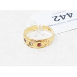 An 18ct gold, diamond and garnet ring, approx. ring size Q, approx. 3.8 g (all in)