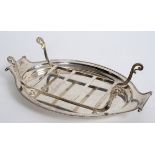An oval silver asparagus dish, with a drainer, for Harrods, Sheffield 1912, approx. 30.9 ozt, 37