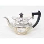 A silver teapot, with later embossed decoration, London 1810, approx. 13.3 ozt (all in)