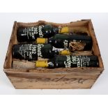 Twelve bottles of Niepoort vintage port, 1982, in own wooden case (lacking lid) See illustration