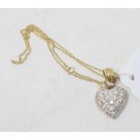 A 9ct yellow gold and diamond heart shaped pendant, on a chain