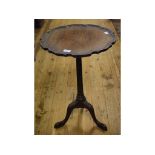 A George III style tripod table, 45 cm diameter